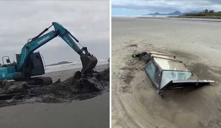 carro-que-ficou-soterrado-em-praia-de-itanhaem-e-retirado